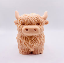 Load image into Gallery viewer, Handmade vegan soaps featuring a large detailed highland cow. crafted with natural French clays, activated charcoal and essential oils. a eco-friendly, zero waste gift that’s cruelty-free, skin-nourishing, and perfect for highland coo lovers and animal themed gifts. small business UK