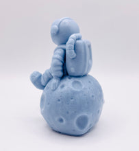 Load image into Gallery viewer, Handmade vegan soaps featuring a detailed astronaut / spaceman sitting on the moon. crafted with natural French clays, activated charcoal and essential oils. a eco-friendly, zero waste gift that’s cruelty-free, skin-nourishing, and perfect for space lover gifts. gifts for him. Small Business UK