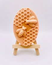 Load image into Gallery viewer, Handmade vegan soaps featuring two bees on honeycomb wrapped in beautiful eco friendly packaging crafted with natural French clays, activated charcoal and essential oils. a eco-friendly, zero waste gift that’s cruelty-free, skin-nourishing, and perfect gift for bee lovers and animal themed gifts. small business UK
