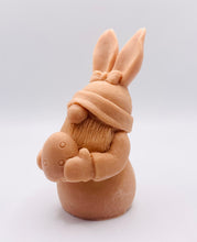 Load image into Gallery viewer, Handmade vegan soaps featuring a gorgeous gnome with easter bunny ears, holding his easter egg packaged in beautiful eco friendly packaging. crafted with natural French clays, activated charcoal and essential oils. a eco-friendly, zero waste gift thatās cruelty-free, skin-nourishing, the perfect gift for any easter hamper or gnome lover. UK Small Business