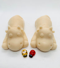 Load image into Gallery viewer, Handmade vegan soaps featuring a set of two sleeping cows . gift boxed in beautiful eco friendly packaging. crafted with natural French clays, activated charcoal and essential oils. a eco-friendly, zero waste gift that’s cruelty-free, skin-nourishing, the perfect gift for cow lovers and animal lovers. UK Small Business