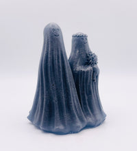 Load image into Gallery viewer, Handmade vegan soaps shaped as a ghost bride and groom. crafted with natural French clays, activated charcoal and essential oils. a eco-friendly, zero waste gift that’s cruelty-free, skin-nourishing, and perfect for Halloween weddings and gifting.
small business UK