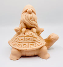 Load image into Gallery viewer, Handmade vegan soaps featuring a detailed turtle with a gnome catching a ride on his back soap. crafted with natural French clays, activated charcoal and essential oils. a eco-friendly, zero waste gift that’s cruelty-free, skin-nourishing, and perfect for turtle lovers and gnome lover gifts. small business UK