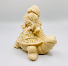 Load image into Gallery viewer, Handmade vegan soaps featuring a detailed turtle with a gnome catching a ride on his back soap. crafted with natural French clays, activated charcoal and essential oils. a eco-friendly, zero waste gift that’s cruelty-free, skin-nourishing, and perfect for turtle lovers and gnome lover gifts. small business UK