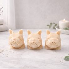 Load image into Gallery viewer, Three French bulldog-shaped soaps on a white surface with decorative elements.