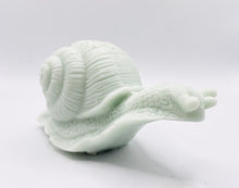 Load image into Gallery viewer, Handmade vegan soaps featuring a detailed snail, in beautiful eco friendly packaging. crafted with natural French clays, activated charcoal and essential oils. a eco-friendly, zero waste gift that’s cruelty-free, skin-nourishing, the perfect gift for snail lovers, gardeners or for animal lovers. small business UK