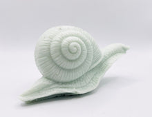 Load image into Gallery viewer, Handmade vegan soaps featuring a detailed snail, in beautiful eco friendly packaging. crafted with natural French clays, activated charcoal and essential oils. a eco-friendly, zero waste gift that’s cruelty-free, skin-nourishing, the perfect gift for snail lovers, gardeners or for animal lovers. small business UK