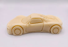 Load image into Gallery viewer, Handmade vegan soaps featuring a sports car wrapped in beautiful eco friendly packaging crafted with natural French clays, activated charcoal and essential oils. a eco-friendly, zero waste gift that’s cruelty-free, skin-nourishing, and perfect gift for sports car lovers and gifts for him. small business UK