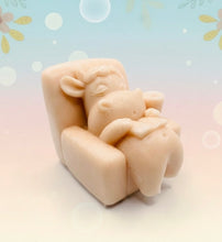 Load image into Gallery viewer, Handmade vegan cow sleeping on the sofa with book and coffee, shaped vegan soaps gift boxed. crafted with natural French clays, activated charcoal and essential oils. a eco-friendly, zero waste gift that’s cruelty-free, skin-nourishing, and perfect for animal lovers and gifting. small business UK