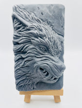 Load image into Gallery viewer, Handmade vegan soaps featuring a highly detailed wolf. crafted with natural French clays, activated charcoal and essential oils. a eco-friendly, zero waste gift that’s cruelty-free, skin-nourishing, and perfect for animal lover gifts and gifts for him. small business UK