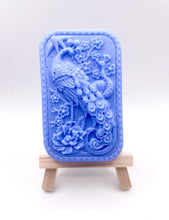 Load image into Gallery viewer, Handmade vegan soaps featuring a detailed peacock, in beautiful eco friendly packaging. crafted with natural French clays, activated charcoal and essential oils. a eco-friendly, zero waste gift that’s cruelty-free, skin-nourishing, the perfect gift for peacock lovers or for animal lovers. small business UK