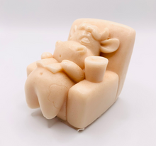 Load image into Gallery viewer, Handmade vegan cow sleeping on the sofa with book and coffee, shaped vegan soaps. crafted with natural French clays, activated charcoal and essential oils. a eco-friendly, zero waste gift that’s cruelty-free, skin-nourishing, and perfect for animal lovers and gifting. small business UK