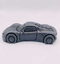 Load image into Gallery viewer, Handmade vegan soaps featuring a sports car wrapped in beautiful eco friendly packaging crafted with natural French clays, activated charcoal and essential oils. a eco-friendly, zero waste gift that’s cruelty-free, skin-nourishing, and perfect gift for sports car lovers and gifts for him. small business UK