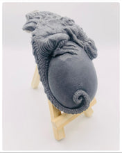 Load image into Gallery viewer, Dinosaur Gift | dinosaur Lover Gift | dragon Lover Gift | alternative Gift | Dragon & Egg Vegan Soap Check out this majestic dragon guarding a mysterious, enchanting egg – all captured in a luxurious bar of soap! Vegan, cruelty-free, and elegantly wrapped in eco-friendly packaging. All our soaps are made with natural clays and essential oils to gently cleanse and nourish your skin. Plus, they come in eco-friendly packaging so you can feel good about your purchase and the environment.
