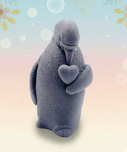 Load image into Gallery viewer, Handmade vegan soaps featuring a penguin holding a love heart packaged in beautiful eco friendly packaging crafted with natural French clays, activated charcoal and essential oils. a eco-friendly, zero waste gift that’s cruelty-free, skin-nourishing, and perfect for penguin lovers, christmas gifts and animal themed gifts. small business UK