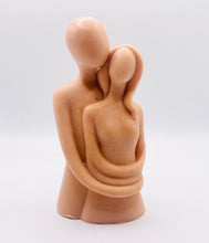 Load image into Gallery viewer, Handmade vegan soaps featuring a man embracing a woman, in beautiful eco friendly packaging. crafted with natural French clays, activated charcoal and essential oils. a eco-friendly, zero waste gift that’s cruelty-free, skin-nourishing, the perfect gift for valentines day or for anniversaries. small business UK