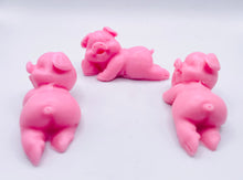 Load image into Gallery viewer, Handmade vegan soaps featuring a set of three cute laughing pigs, gift boxed in beautiful eco friendly packaging. crafted with natural French clays, activated charcoal and essential oils. a eco-friendly, zero waste gift thatās cruelty-free, skin-nourishing, and perfect for animal lovers, pig lovers and teacher appreciation gifts. small business UK