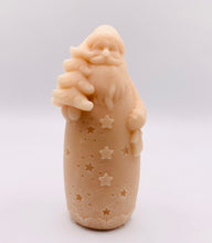 Load image into Gallery viewer, Christmas Gift UK. Handmade Father Christmas vegan soap in indigo blue, detailed with a long beard, cosy hat, flowing robe with star cutouts, and holding a small Christmas tree over one shoulder and a lantern in the other hand. available in your own choice of coloured clays and essential oils. zero waste gift UK.