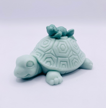 Load image into Gallery viewer, Turtle gift. Frog gift. Zero waste gift. Modern gift idea. Handmade home style. Slow and steady wins the race… especially when you’ve got a little frog friend catching a ride! 🐢💚 This adorable Turtle & Frog Soap is handmade with love, gentle on the skin and kind to the planet! Guaranteed to raise a smile every time you use it!!! 😃
Perfect for nature lovers, animal fans, or anyone who enjoys a bit of fun in their self-care routine. These two are the ultimate bathroom buddies! 🌿✨