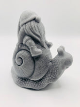 Load image into Gallery viewer, Handmade vegan soaps featuring a detailed snail with a gnome catching a ride on his back soap. crafted with natural French clays, activated charcoal and essential oils. a eco-friendly, zero waste gift that’s cruelty-free, skin-nourishing, and perfect for turtle lovers and gnome lover gifts. small business UK