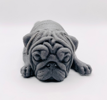 Load image into Gallery viewer, Handmade vegan soap featuring sleepy pug lying down and packed in beautiful eco friendly packaging. crafted with natural French clays, activated charcoal and essential oils. a eco-friendly, zero waste gift that’s cruelty-free, skin-nourishing, and perfect for pug owners, dog lovers or animal themed gifts. Small business UK