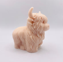 Load image into Gallery viewer, Handmade vegan soaps featuring a large detailed highland cow. crafted with natural French clays, activated charcoal and essential oils. a eco-friendly, zero waste gift that’s cruelty-free, skin-nourishing, and perfect for highland coo lovers and animal themed gifts. small business UK