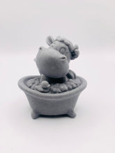Load image into Gallery viewer, Handmade vegan soap featuring a cow in the bath scrubbing his back and packed in beautiful eco friendly packaging. crafted with natural French clays, activated charcoal and essential oils. a eco-friendly, zero waste gift that’s cruelty-free, skin-nourishing, and perfect for cow lovers or animal themed gifts. Small business UK