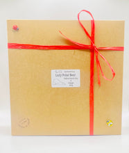 Load image into Gallery viewer, Handmade vegan soaps featuring a huge lazy polar bear with his bum up in the air. gift boxed in beautiful eco friendly packaging. crafted with natural French clays, activated charcoal and essential oils. a eco-friendly, zero waste gift that’s cruelty-free, skin-nourishing, the perfect gift for polar bear lovers, Christmas gifts or for animal lover gifts. small business UK