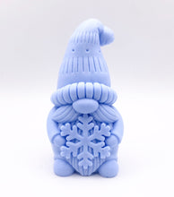 Load image into Gallery viewer, Handmade vegan soaps featuring a christmas gnome holding a snowflake in beautiful eco friendly packaging crafted with natural French clays, activated charcoal and essential oils. a eco-friendly, zero waste gift that’s cruelty-free, skin-nourishing, and perfect for gnome lovers and christmas themed gifts. small business UK