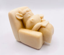Load image into Gallery viewer, Handmade vegan cow sleeping on the sofa with book and coffee, shaped vegan soaps. crafted with natural French clays, activated charcoal and essential oils. a eco-friendly, zero waste gift that’s cruelty-free, skin-nourishing, and perfect for animal lovers and gifting. small business UK