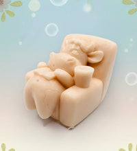 Load image into Gallery viewer, Handmade vegan cow sleeping on the sofa with book and coffee, shaped vegan soaps gift boxed. crafted with natural French clays, activated charcoal and essential oils. a eco-friendly, zero waste gift that’s cruelty-free, skin-nourishing, and perfect for animal lovers and gifting. small business UK