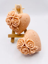Load image into Gallery viewer, Handmade vegan soaps featuring a set of two love heart soaps with wording I LOVE U with flowers, gift boxed in beautiful eco friendly packaging. crafted with natural French clays, activated charcoal and essential oils. a eco-friendly, zero waste gift that’s cruelty-free, skin-nourishing, and perfect for romantic valentines gifts and anniversary gifts. small business UK