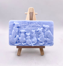 Load image into Gallery viewer, dog lover gift. cat lover gift. animal lover gift. zero waste gift. modern gifts. handmade home style. This beautifully detailed, chunky bar features a line-up of our loyal four-legged friends, reminding us of the love, joy, and muddy footprints they bring into our lives. The one in the photo is made with charcoal and lavender essential oil, soothing, earthy, and perfect for washing the day away (or after a long dog walk!). eco conscious home. eco conscious living.