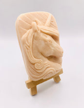 Load image into Gallery viewer, Handmade vegan soaps featuring a unicorn head and wrapped in beautiful eco friendly packaging crafted with natural French clays, activated charcoal and essential oils. a eco-friendly, zero waste gift that’s cruelty-free, skin-nourishing, and perfect gift for unicorn lovers. small business UK