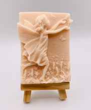 Load image into Gallery viewer, Handmade vegan soap featuring a pretty fairy chasing a butterfly and packaged in beautiful eco friendly packaging. crafted with natural French clays, activated charcoal and essential oils. a eco-friendly, zero waste gift thatās cruelty-free, skin-nourishing, and perfect for fairy lovers and whimsical themed gifts. Small business UK