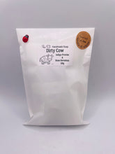 Load image into Gallery viewer, Handmade vegan soap featuring a cow in the bath scrubbing his back and packed in beautiful eco friendly packaging. crafted with natural French clays, activated charcoal and essential oils. a eco-friendly, zero waste gift that’s cruelty-free, skin-nourishing, and perfect for cow lovers or animal themed gifts. Small business UK