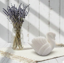 Load image into Gallery viewer, A beautiful handmade vegan soap in the shape of a graceful swan with detailed wing feathers, displayed against a whimsical background for an elegant farmhouse decor gift.