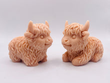 Load image into Gallery viewer, Handmade vegan soaps featuring a set of two chunky highland cow soaps, gift boxed .. crafted with natural French clays, activated charcoal and essential oils. a eco-friendly, zero waste gift that’s cruelty-free, skin-nourishing, and perfect for animal lover gifts and highland cow gifts for her. UK Small Business.