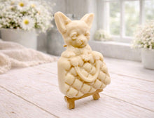 Load image into Gallery viewer, A highly detailed handmade vegan soap in a speckled grey marble finish, sculpted as a small chihuahua puppy with large ears peeking out from inside a quilted designer-style handbag, displayed on a miniature wooden easel.
