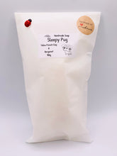 Load image into Gallery viewer, Handmade vegan soap featuring sleepy pug lying down and packed in beautiful eco friendly packaging. crafted with natural French clays, activated charcoal and essential oils. a eco-friendly, zero waste gift that’s cruelty-free, skin-nourishing, and perfect for pug owners, dog lovers or animal themed gifts. Small business UK