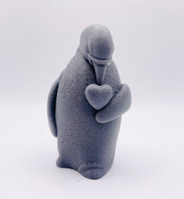 Load image into Gallery viewer, Handmade vegan soaps featuring a penguin holding a love heart packaged in beautiful eco friendly packaging crafted with natural French clays, activated charcoal and essential oils. a eco-friendly, zero waste gift that’s cruelty-free, skin-nourishing, and perfect for penguin lovers, christmas gifts and animal themed gifts. small business UK