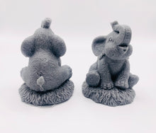 Load image into Gallery viewer, Handmade vegan soaps featuring a set of two baby elephants, gift boxed in beautiful eco friendly packaging. crafted with natural French clays, activated charcoal and essential oils. a eco-friendly, zero waste gift that’s cruelty-free, skin-nourishing, the perfect gift for elephant lovers or for animal lovers. small business UK