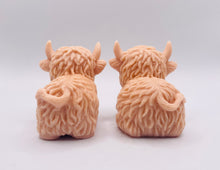 Load image into Gallery viewer, Handmade vegan soaps featuring a set of two chunky highland cow soaps, gift boxed .. crafted with natural French clays, activated charcoal and essential oils. a eco-friendly, zero waste gift that’s cruelty-free, skin-nourishing, and perfect for animal lover gifts and highland cow gifts for her. UK Small Business.