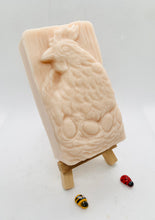 Load image into Gallery viewer, Handmade vegan soaps featuring a chicken sat on her nest of eggs, in beautiful eco friendly packaging. crafted with natural French clays, activated charcoal and essential oils. a eco-friendly, zero waste gift that’s cruelty-free, skin-nourishing, the perfect gift for easter and animal lovers. small business UK