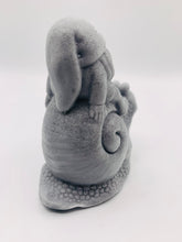 Load image into Gallery viewer, Handmade vegan soaps featuring a detailed snail with a gnome catching a ride on his back soap. crafted with natural French clays, activated charcoal and essential oils. a eco-friendly, zero waste gift that’s cruelty-free, skin-nourishing, and perfect for turtle lovers and gnome lover gifts. small business UK