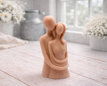 Load image into Gallery viewer, Handmade vegan soaps featuring a man embracing a woman, in beautiful eco friendly packaging.