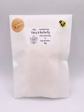 Load image into Gallery viewer, Handmade vegan soap featuring a pretty fairy chasing a butterfly and packaged in beautiful eco friendly packaging. crafted with natural French clays, activated charcoal and essential oils. a eco-friendly, zero waste gift thatās cruelty-free, skin-nourishing, and perfect for fairy lovers and whimsical themed gifts. Small business UK