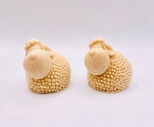 Load image into Gallery viewer, Handmade vegan soap featuring a set of two spring lambs and gift boxed in beautiful eco friendly packaging. crafted with natural French clays, activated charcoal and essential oils. a eco-friendly, zero waste gift that’s cruelty-free, skin-nourishing, and perfect for easter, sheep lovers or animal themed gifts. Small business UK