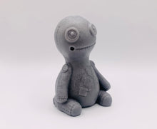 Load image into Gallery viewer, Handmade vegan soaps featuring a voodoo doll with stitching soap. crafted with natural French clays, activated charcoal and essential oils. a eco-friendly, zero waste gift that’s cruelty-free, skin-nourishing, and perfect for alternative gifts and Halloween gifts. Small business UK