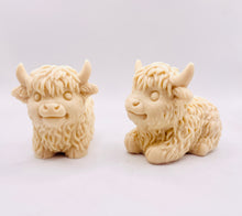 Load image into Gallery viewer, Handmade vegan soaps featuring a set of two chunky highland cow soaps, gift boxed .. crafted with natural French clays, activated charcoal and essential oils. a eco-friendly, zero waste gift that’s cruelty-free, skin-nourishing, and perfect for animal lover gifts and highland cow gifts for her. UK Small Business.